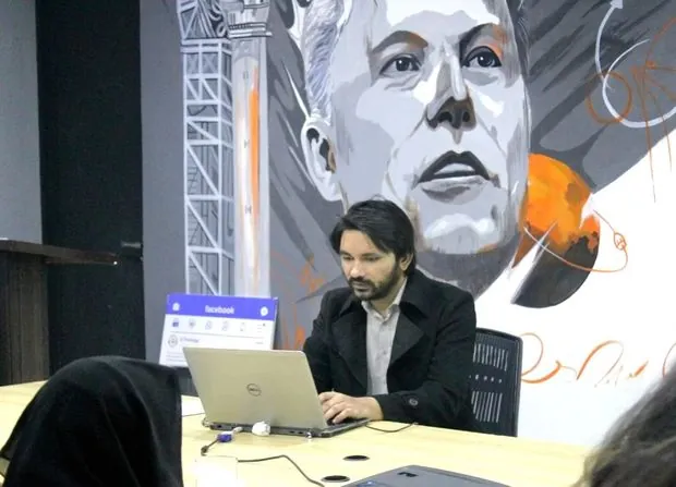 Shahzaib at work
